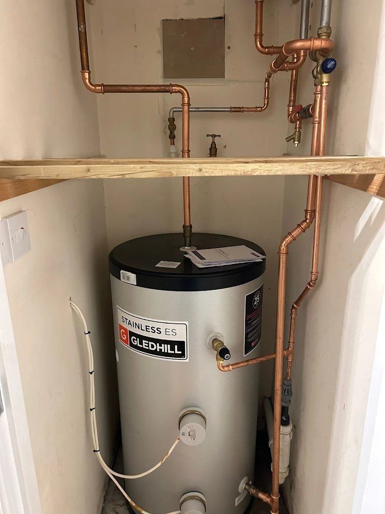 Gledhill Stainless unvented hot water cylinder with copper pipework and expansion vessel